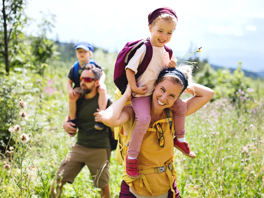 family on hike shutterstock_1823719313 copy Family nature walk